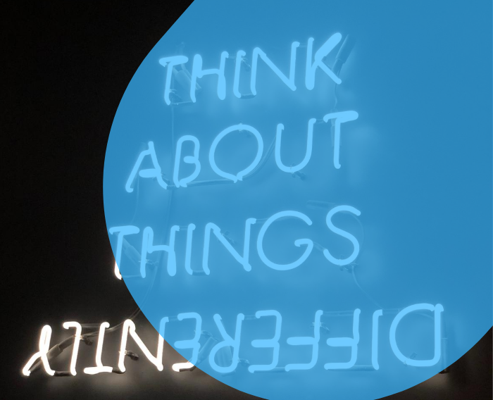 Think about things differently neon sign with blue filter